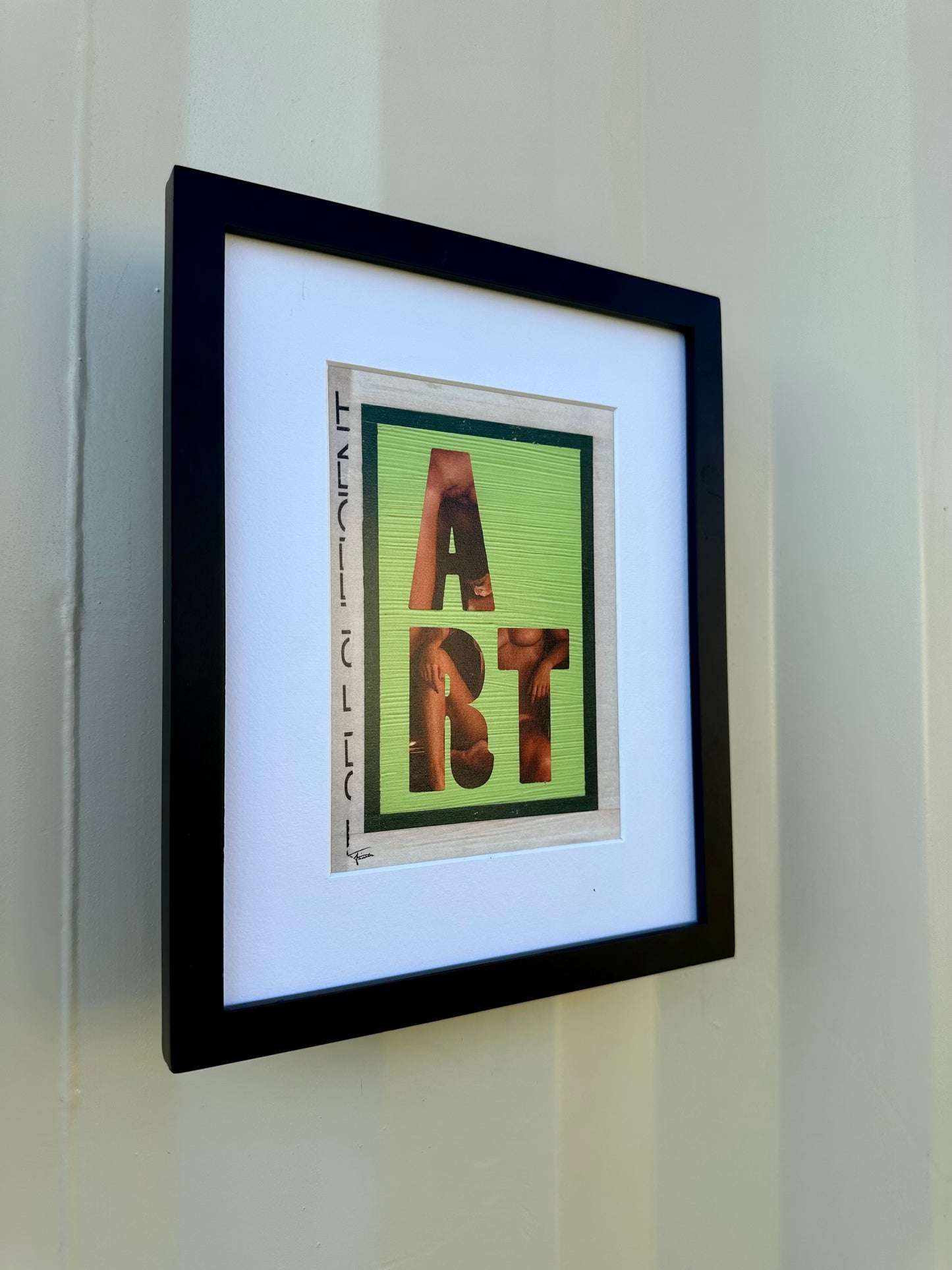 Framed print of original mixed media art featuring the word ART over image from vintage magazine